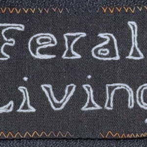Feral Living sew on patch - Silver thread on Black canvas